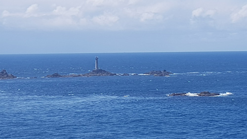 Take in the breathtaking view from Land's End looking out to sea. Enjoy the dramatic cliffs and expansive Atlantic Ocean from the westernmost point of mainland England.