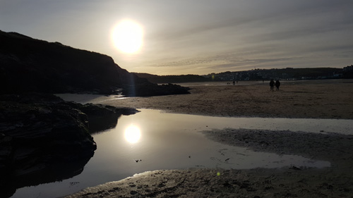 Discover Perranporth Beach in Cornwall, known for its expansive golden sands, clear waters, and vibrant surf scene. Ideal for beach activities, relaxation, and scenic coastal views.