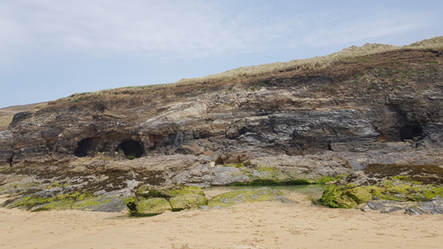 Discover Perranporth Beach in Cornwall, known for its expansive golden sands, clear waters, and vibrant surf scene. Ideal for beach activities, relaxation, and scenic coastal views.