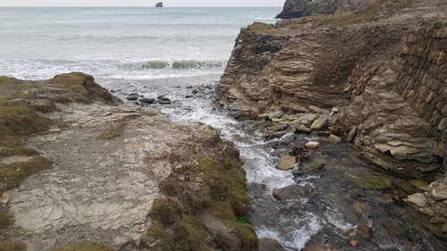 Discover Perranporth Beach in Cornwall, known for its expansive golden sands, clear waters, and vibrant surf scene. Ideal for beach activities, relaxation, and scenic coastal views.