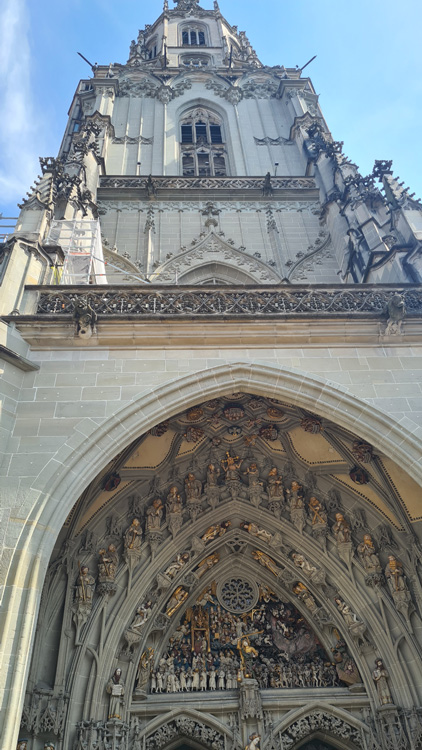 Bern Cathedral with towering gothic architecture and intricate details