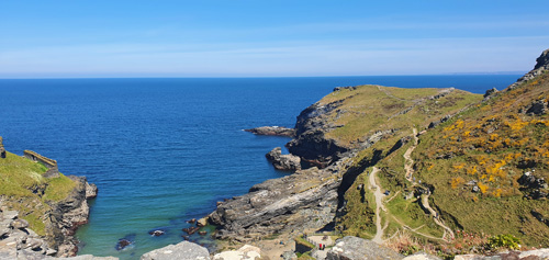 Experience stunning coastal views from Tintagel Castle, perched high on rugged cliffs. Discover breathtaking panoramas of the Atlantic Ocean and dramatic shoreline, offering a glimpse into the castle's rich history and natural beauty.
