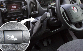 Close-up of the Payload Assist button in the Fiat Ducato, providing added comfort for drivers when loading heavy cargo.