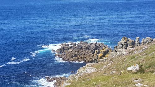 Take in the breathtaking view from Land's End looking out to sea. Enjoy the dramatic cliffs and expansive Atlantic Ocean from the westernmost point of mainland England.