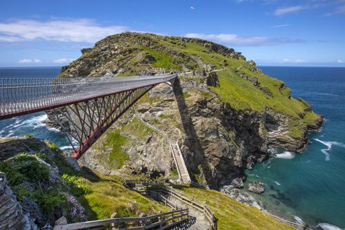 Experience breathtaking views from Tintagel Castle Bridge, offering panoramic vistas of the rugged cliffs and the Atlantic Ocean. Enjoy a dramatic perspective of the castle’s dramatic location and scenic coastal landscape.