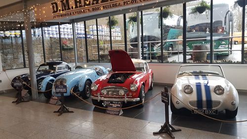 Explore the interior of Healeys Cornish Cyder Farm and admire its collection of vintage cars. Enjoy a unique blend of cider-making history and classic automotive charm in this captivating Cornish attraction.