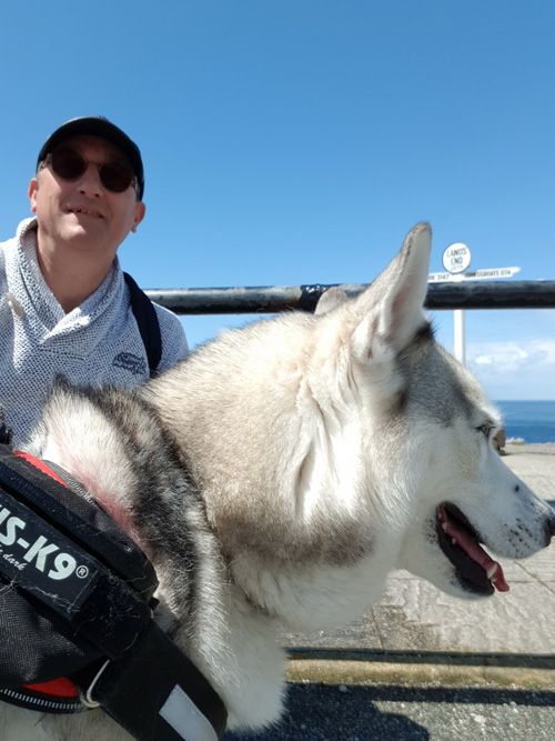 ake a memorable selfie with your dog at Land's End, featuring the iconic direction post. Enjoy stunning coastal views and capture a special moment at the westernmost point of Cornwall.