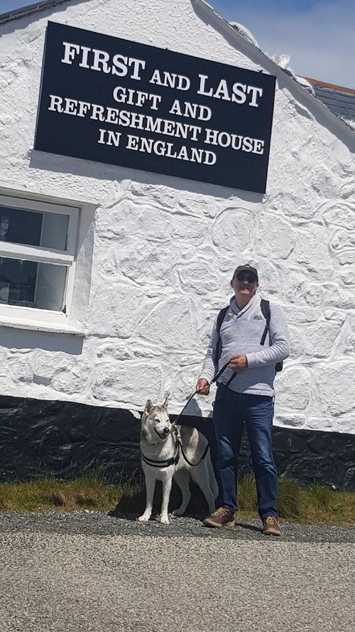 Experience the view from the Last Pub at Land's End, Cornwall. Enjoy picturesque coastal scenery and the iconic Land's End sign from this historic pub, the westernmost pub in mainland England.