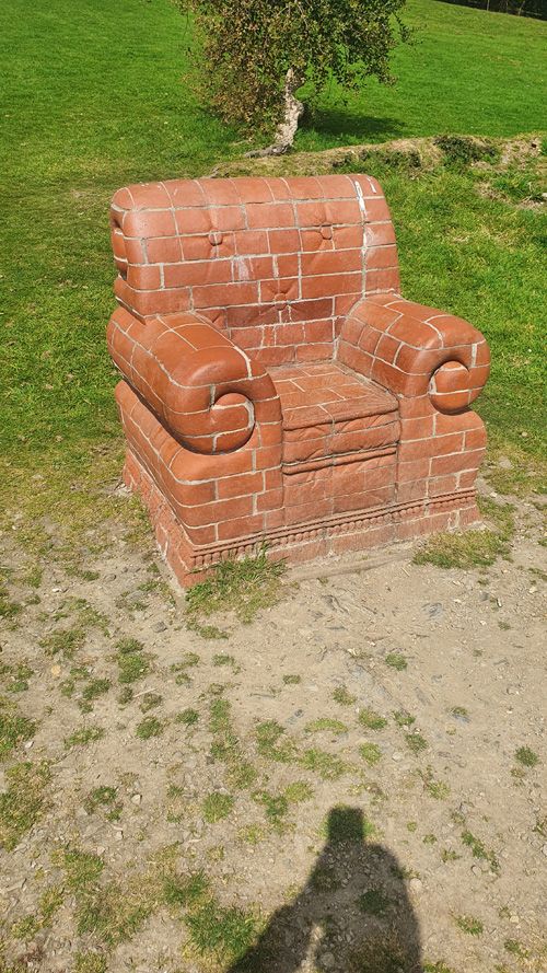 Explore the unique chair sculptures at Tremenheere Sculpture Gardens in Cornwall. Enjoy a blend of contemporary art and lush, subtropical gardens in a tranquil setting.