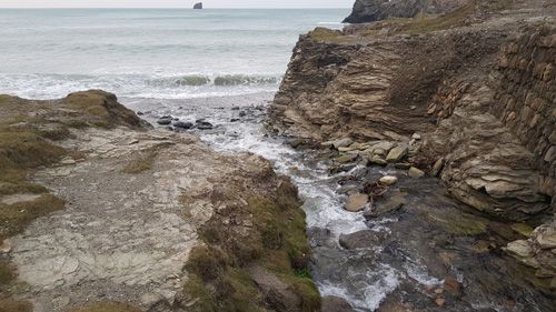 Discover Perranporth Beach in Cornwall, known for its expansive golden sands, clear waters, and vibrant surf scene. Ideal for beach activities, relaxation, and scenic coastal views.