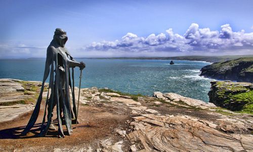 Admire the stunning coastal views from Tintagel Castle, where you can also see the iconic Arthur Statue. Enjoy panoramic vistas of the rugged cliffs and Atlantic Ocean while exploring this historic site.