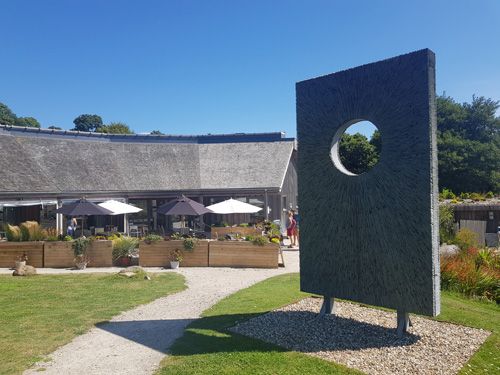 Discover the intriguing wall sculptures at Tremenheere Sculpture Gardens in Cornwall. Experience the unique blend of contemporary art and lush, subtropical gardens in a serene and inspiring setting.