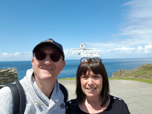 Capture a memorable selfie with the Land's End direction post, showcasing the stunning coastal scenery and iconic sign from the westernmost point of Cornwall.