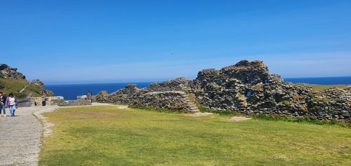 Experience stunning coastal views from Tintagel Castle, perched high on rugged cliffs. Discover breathtaking panoramas of the Atlantic Ocean and dramatic shoreline, offering a glimpse into the castle's rich history and natural beauty.