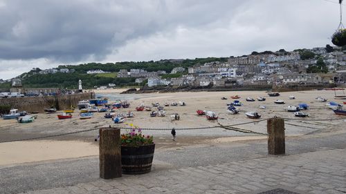 Discover the vibrant seafront of St Ives in Cornwall, featuring picturesque views of golden sands, charming harbor, and lively promenade. Enjoy a stroll along the waterfront and experience the beauty and character of this iconic coastal destination.