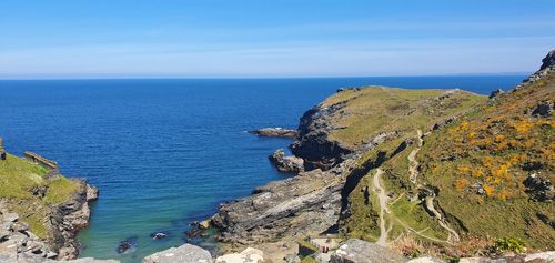 Experience stunning coastal views from Tintagel Castle, perched high on rugged cliffs. Discover breathtaking panoramas of the Atlantic Ocean and dramatic shoreline, offering a glimpse into the castle's rich history and natural beauty.
