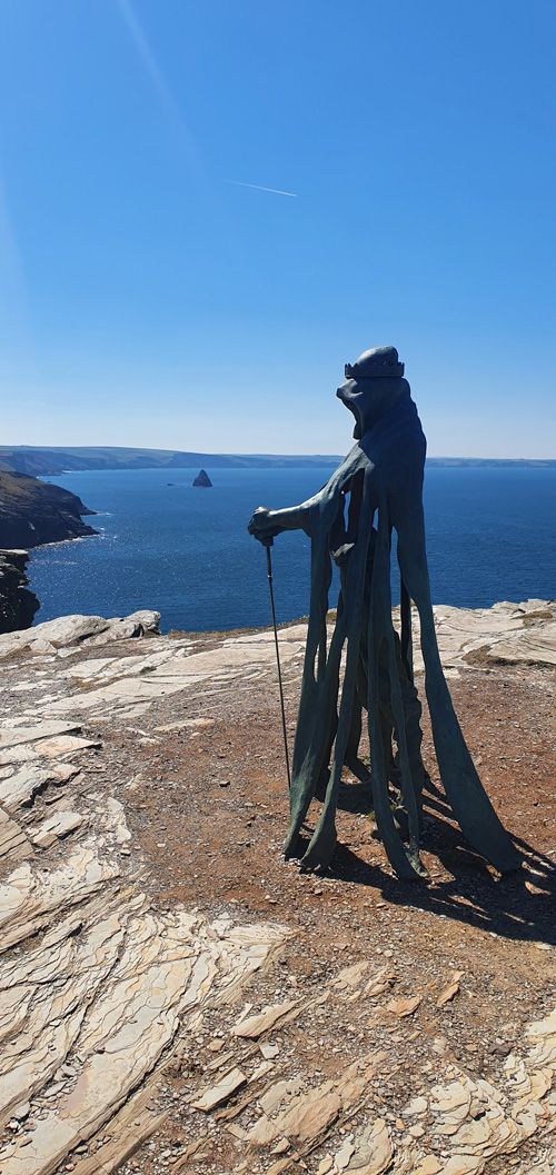 Admire the stunning coastal views from Tintagel Castle, where you can also see the iconic Arthur Statue. Enjoy panoramic vistas of the rugged cliffs and Atlantic Ocean while exploring this historic site.