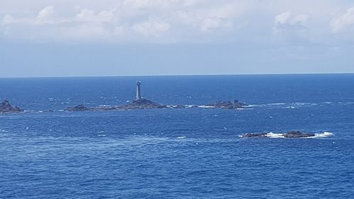 Take in the breathtaking view from Land's End looking out to sea. Enjoy the dramatic cliffs and expansive Atlantic Ocean from the westernmost point of mainland England.