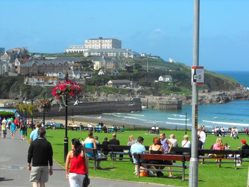 Enjoy a scenic walk to the beach in Newquay, Cornwall. Experience the beauty of coastal paths, vibrant landscapes, and picturesque views as you make your way to the sandy shores of this popular seaside destination.